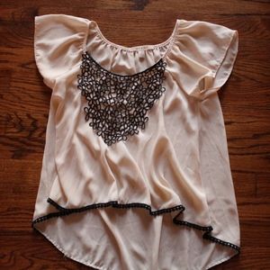 Creme sheer top with flower embroidered lace front